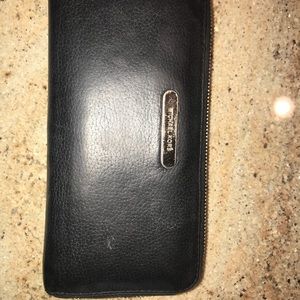 Michael Kors black zip around wallet